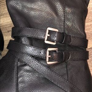 Black patent knee high boots